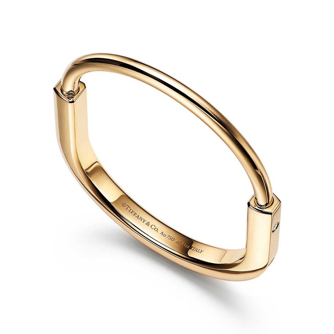 tiffany lock bangle in yellow gold with diamond